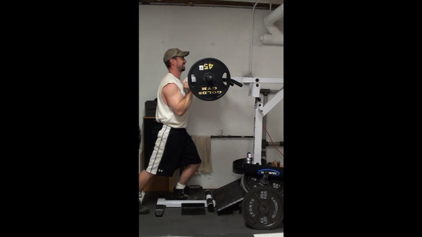 How to do the Shoulder Press on the Standing Calf Raise Machine