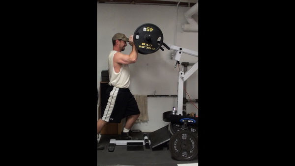 How to do the Shoulder Press on the Standing Calf Raise Machine