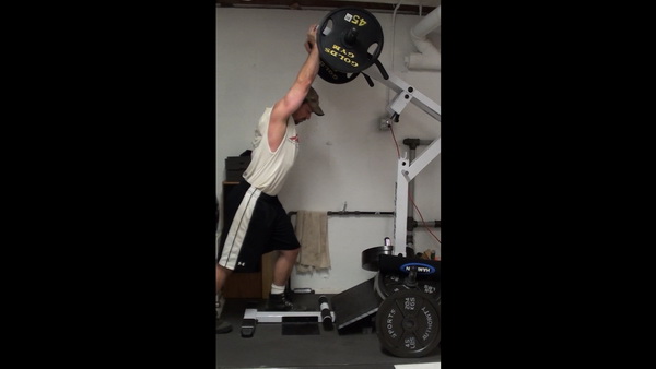 How to do the Shoulder Press on the Standing Calf Raise Machine