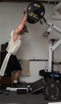 How to do the Shoulder Press on the Standing Calf Raise Machine