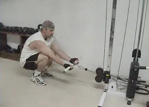 Squatting Cable Curls