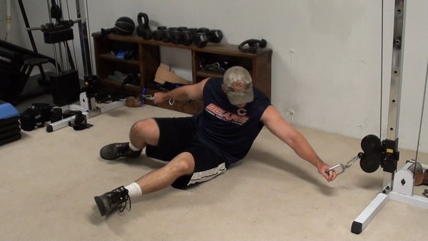 Cable flyes on the floor for harder pecs