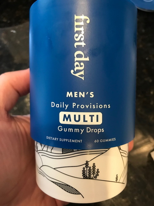 First Day Men's Daily Provisions gummy multivitamin bottle and gummies