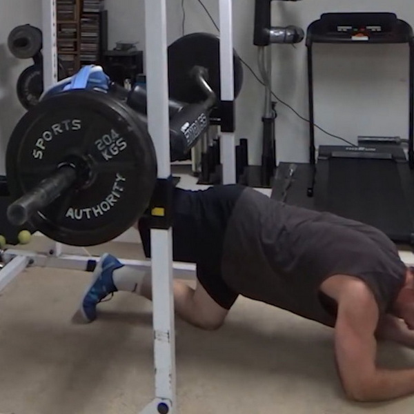 Glute Kickback Machine using a safety squat bar
